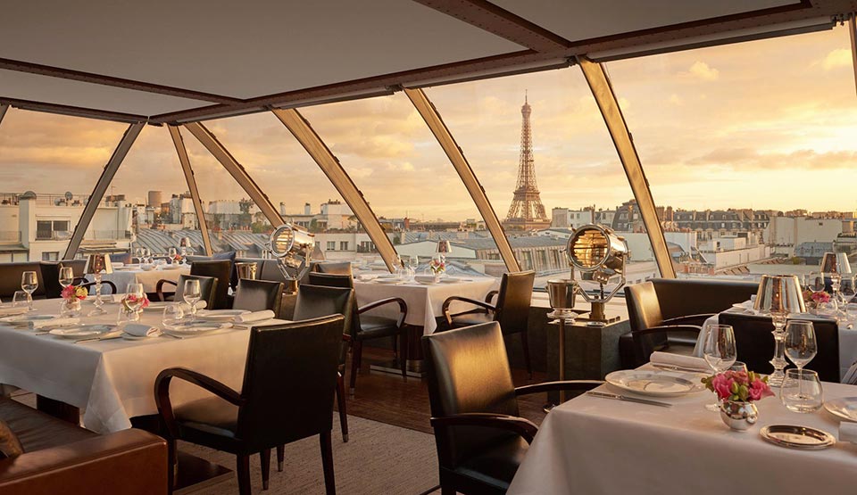 Diners in the Eiffel Tower restaurant, The Paris Hotel, look out